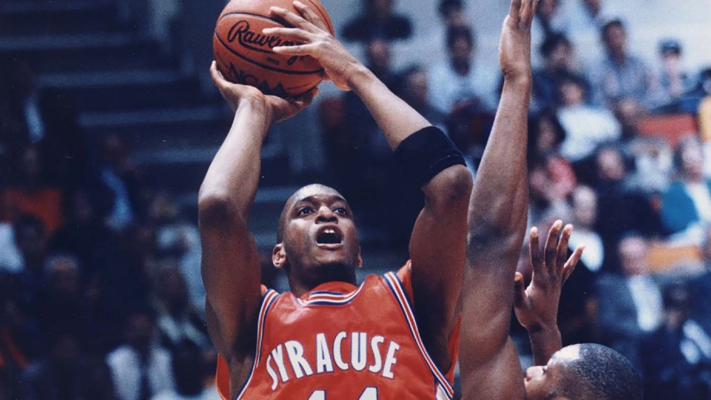 John Wallace playing basketball for the Syracuse Orange