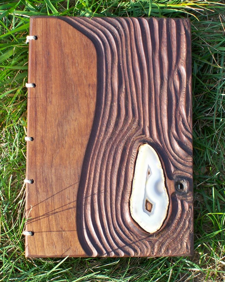 Wood carved and bound. Art by Robert Salvato