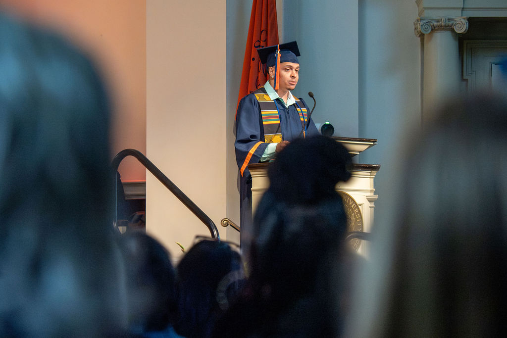 Shayne Turo speaks at the 2026 College of Professional Studies convocation.
